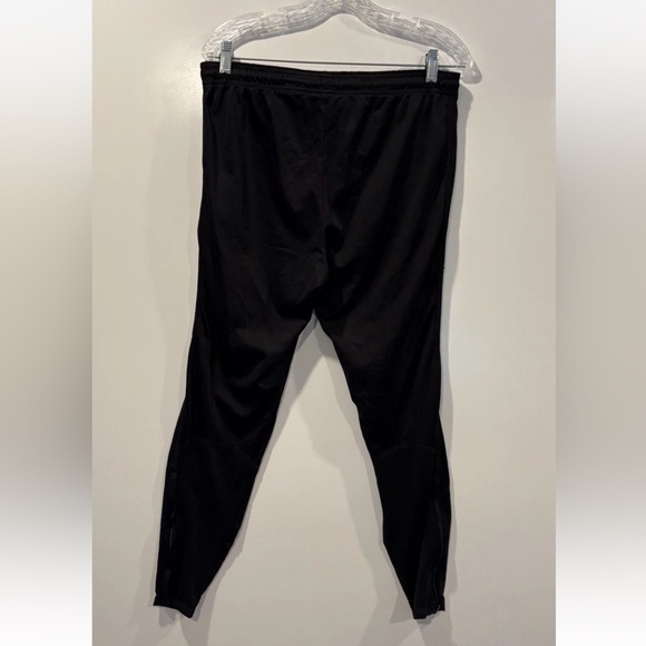 Nike Dri Fit Mens Black Running Jogger Pants Zip Ankle Pockets Size Medium - Picture 2 of 6
